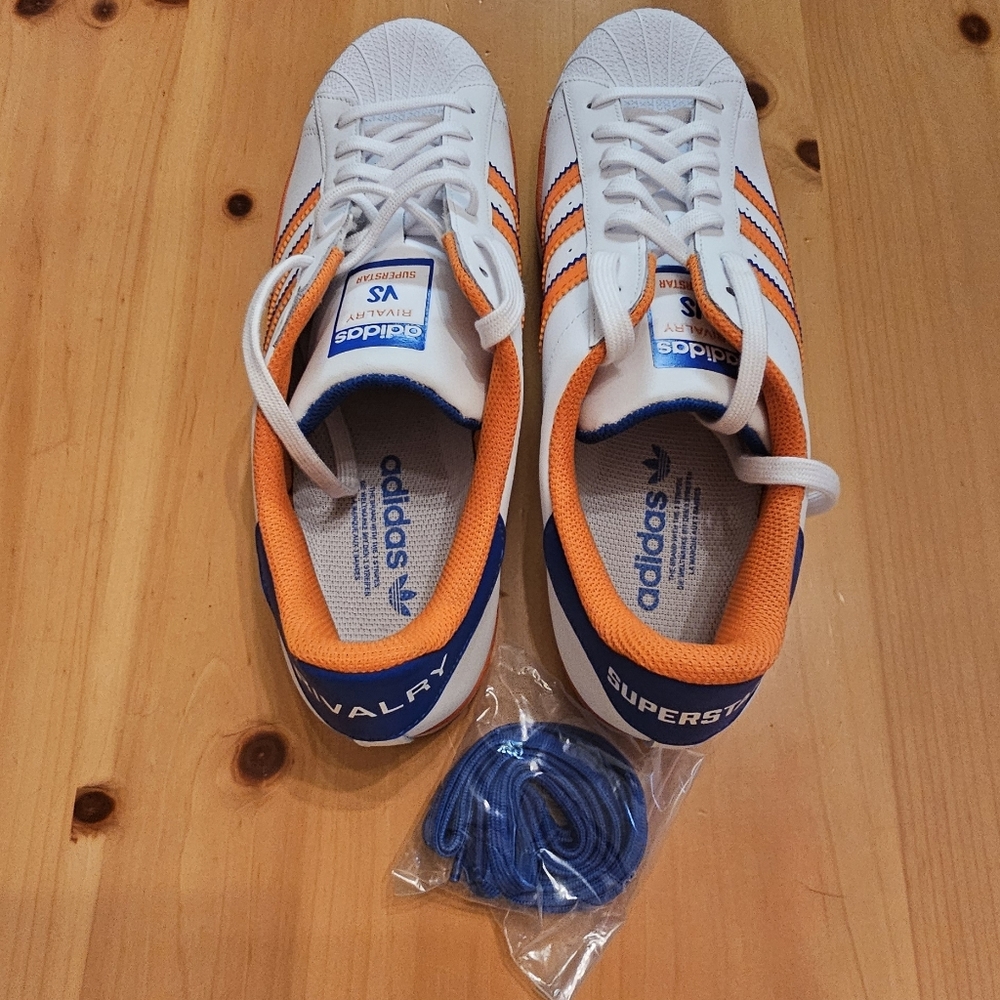 Stylish Adidas sneakers for men White base with orange stripes